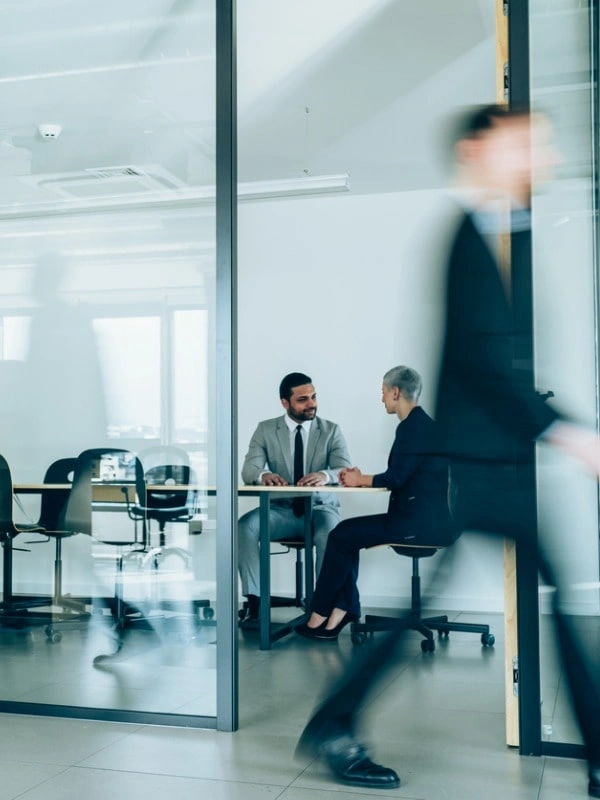 Office meeting through glass